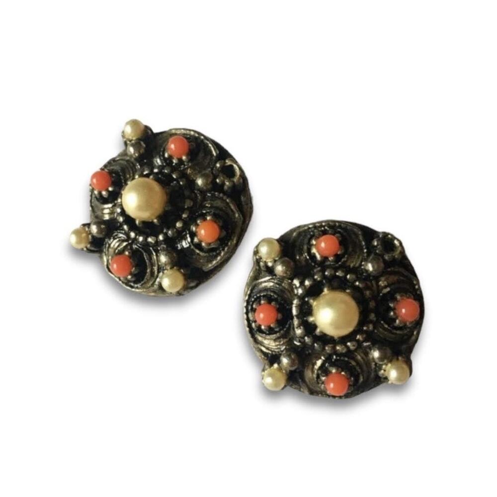 Brass tone clip on earrings with orange and faux pearl accents
